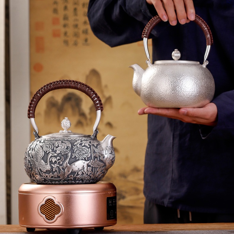 S999银器茶壶茶具 手工敲打錾刻烧水壶煮茶壶 功夫茶壶具图片