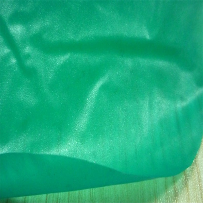 PVC防水膜 绿色0.11mmPVC珠光雨衣膜 防水雨衣布图片