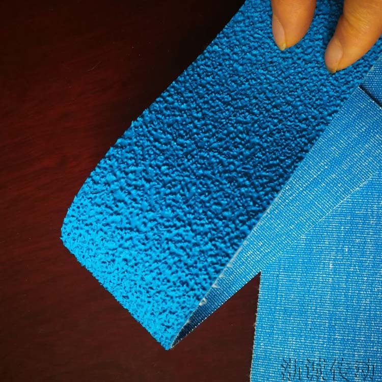 蓝色糙面带包辊皮 验布机卷布机辊筒防滑刺皮 颗粒磨擦皮图片