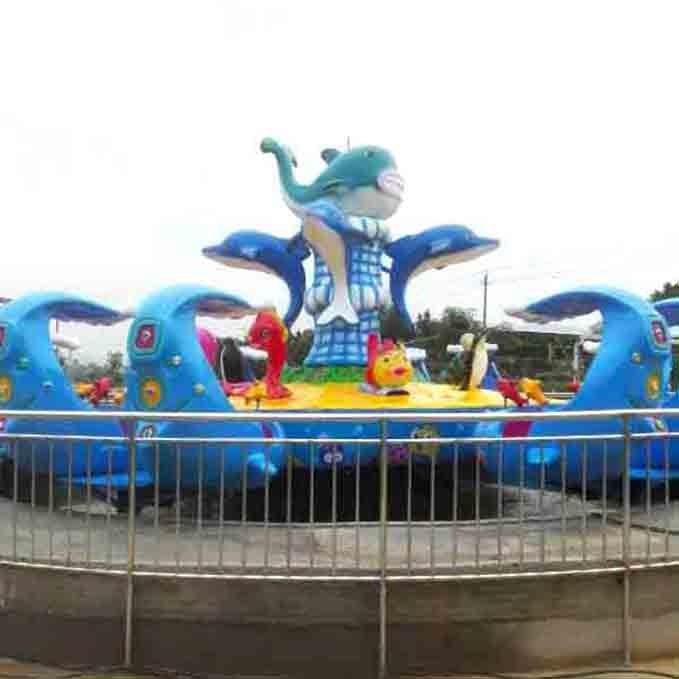 激战鲨鱼岛升级款海洋贝贝游乐设施，供应公园游乐玩具海洋水战，贝壳座舱海豚造型工艺图片